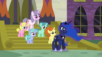 Princess Luna standing in front of unicorn filly S7E10