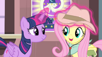 Twilight adjusting Fluttershy's hat S4E11