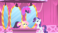 Rarity removing the head dress.