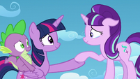 Starlight puts her hoof on Twilight's hoof S5E26