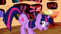 Twilight gets in position for Spike to land on her safely S2E06