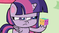 Twilight holding a squishy cube PLS1E3b