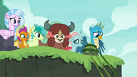 Young Six look over the edge of the cliff S8E9