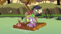 What is Cranky doing with Spike?