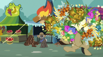 Filthy Rich holding a lot of flowers S7E19