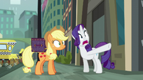 Rarity in shock and pointing her hoof S5E16