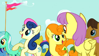 Sweetie Drops and Golden Harvest cheering S2E14