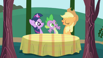 Applejack seats Twilight and Spike at a table S1E01