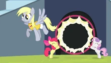 Derpy flying through the hoop S4E24