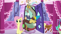 Discord with Fluttershy at the boutique entrance S5E22