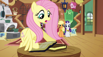 Fluttershy taking the books S3E10