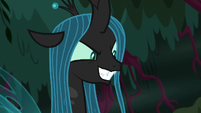 Queen Chrysalis grinning maliciously S8E13