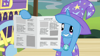 Trixie revealing a reassembled newspaper S7E24