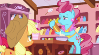 Mrs. Cake somberly pouring cake batter S7E13