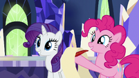 Pinkie holding blank scroll and quill S9E13