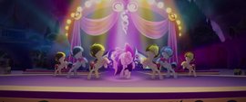 Songbird and backup dancers performing on stage MLPTM