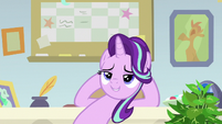 Starlight Glimmer leaning on her desk S9E20