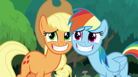 AJ and Rainbow grinning wide at Twilight S8E9