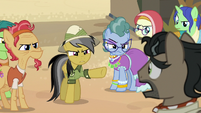 Daring Do and villagers glaring at Dr. Caballeron S7E18