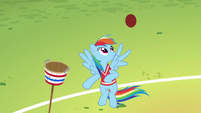 Rainbow Dash juggles a ball with her wing S6E18