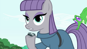 Maud holding sedimentary rock S4E18