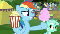 Rainbow holding popcorn and cotton candy S8E20