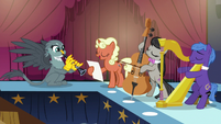 Gabby playing clarinet with Octavia's band S6E19