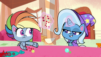 Trixie taking glass beads from Dash PLS1E12a