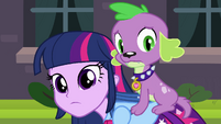 Twilight and Spike looking at a student EG