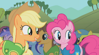 Applejack and Pinkie laughing at Spike S1E11