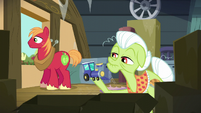 Granny Smith holds a piece of a toy train S5E17