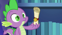 Spike looking confused at unfamiliar scroll S6E15