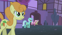 Golden Harvest along with other ponies come out of their homes S1E06