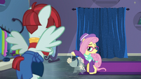 Hipster Fluttershy holding a dress S8E4