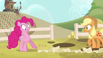 Pinkie Pie pointing to end of scroll S4E09