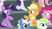 Applejack points at Rainbow's empty seat S8E20