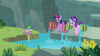 Twilight and Starlight pour water in the creek S7E5