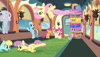 Fluttershy flying upside down? That's new.