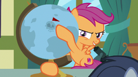 Scootaloo points at skull-shaped island S9E12