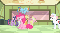 Nurse Redheart throwing out Pinkie S2E13