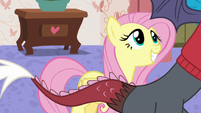 Fluttershy grinning excitedly at Discord S7E12