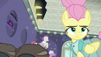 Fluttershy looking away from the raccoons S8E4