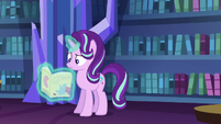 Starlight Glimmer looking at a magazine S6E21