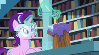 Starlight pouring potion on piece of wood S7E1