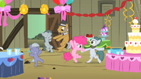 Pinkie Pie dancing with her family.