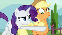 Rarity restraining Applejack's anger S7E9