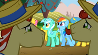 A stunned-looking Lyra and a happy-looking Rainbow Dash.