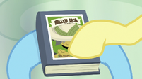 Fluttershy pointing at Martingale's name S9E21