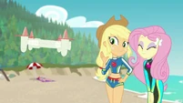 Applejack and Fluttershy smile for the drone EGFF