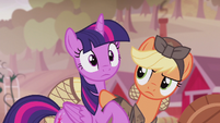 Applejack shoves Twilight off of her S5E25